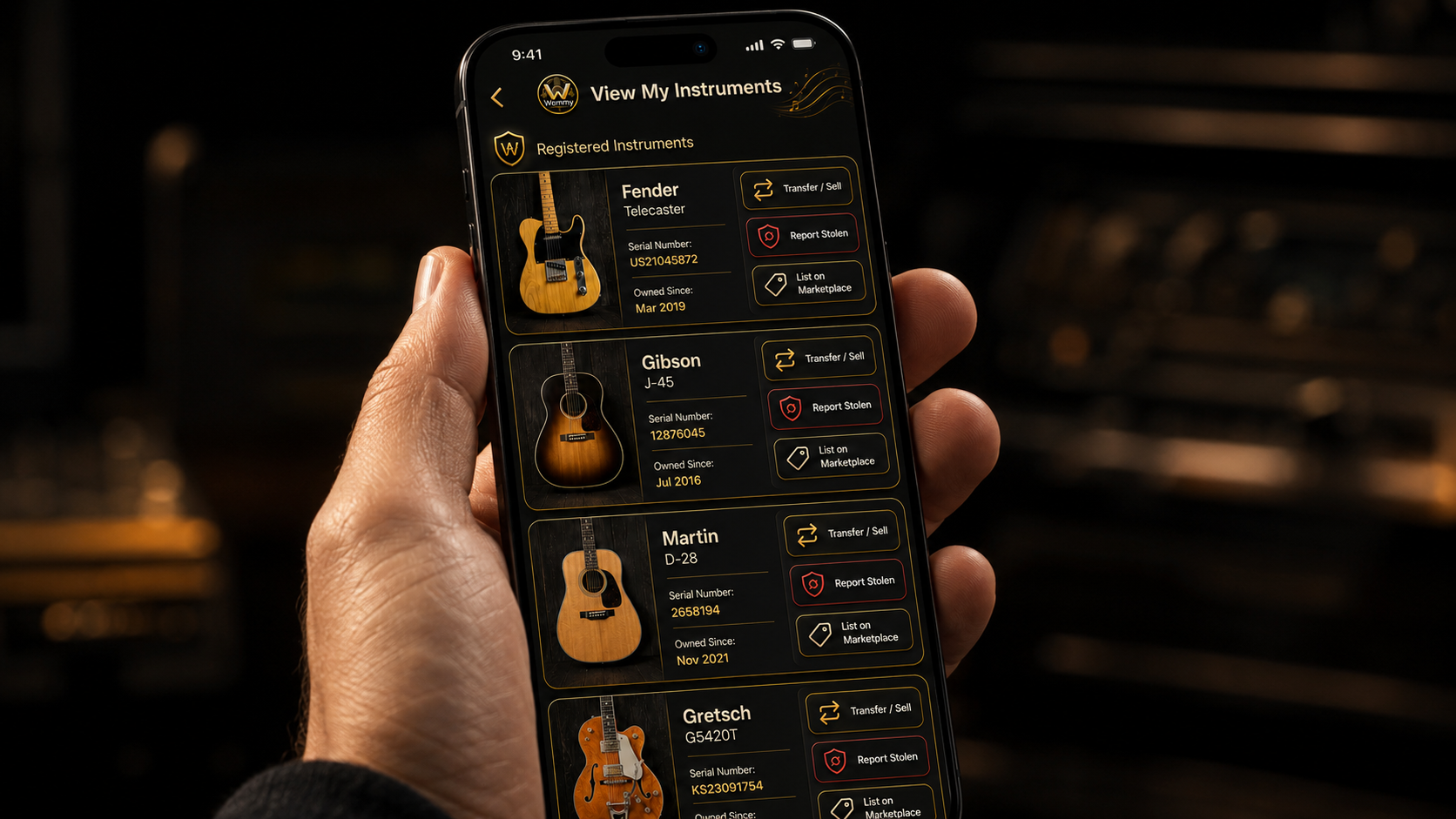 The Wammy instrument registry displayed on a phone held in a musician's hand